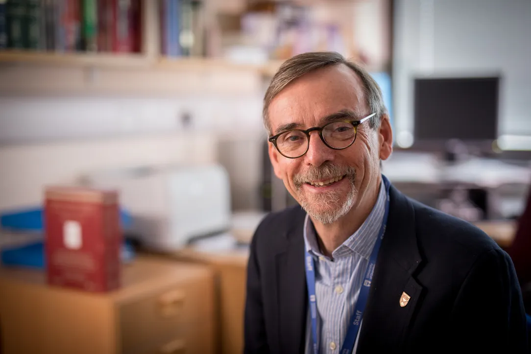 Professor Bob Steele sits in his office