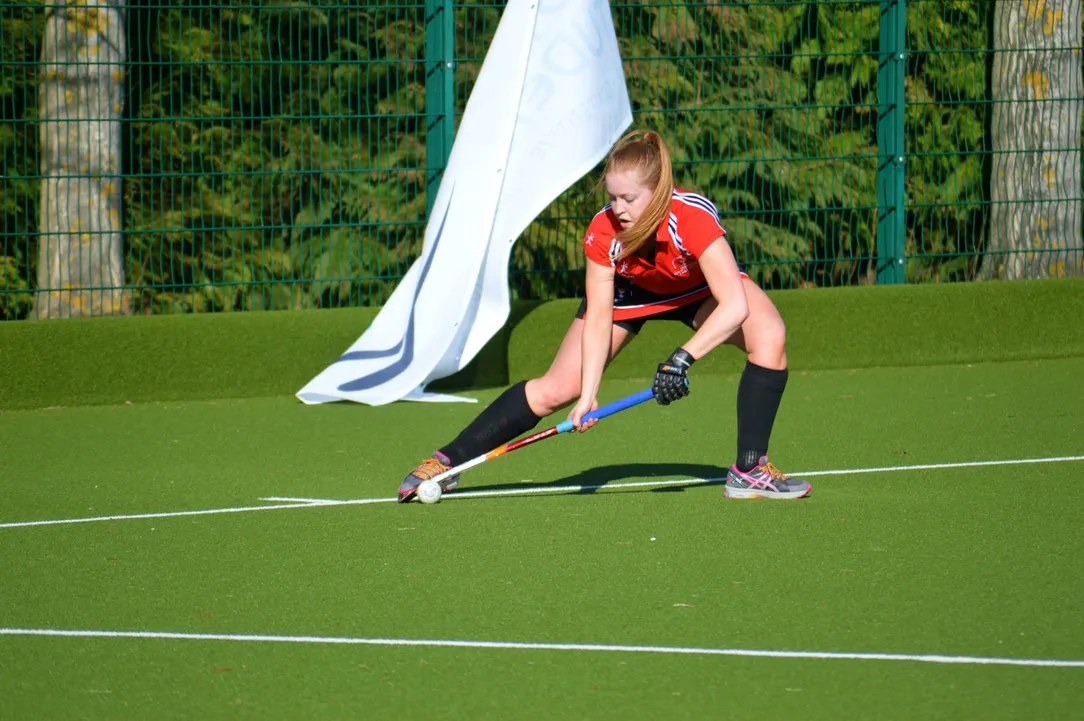 a woman playing hockey