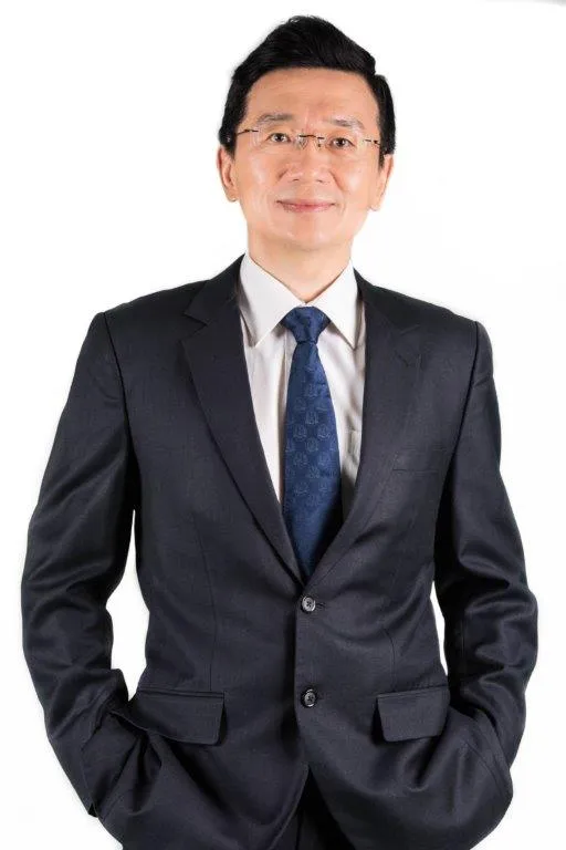 Pon Poh Hsu in a suit
