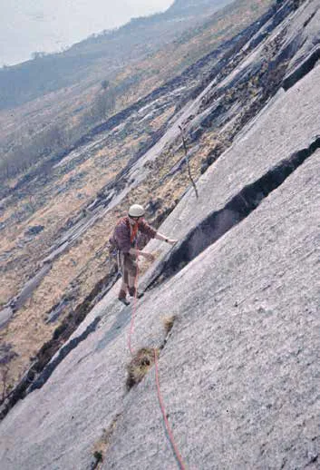 A climber climbing a mountain
