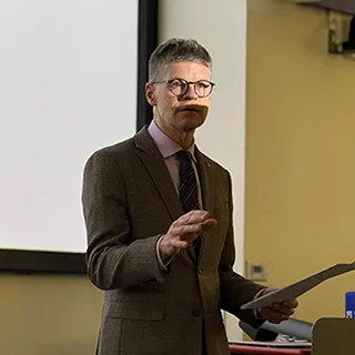 Rory McCrimmon giving a speech