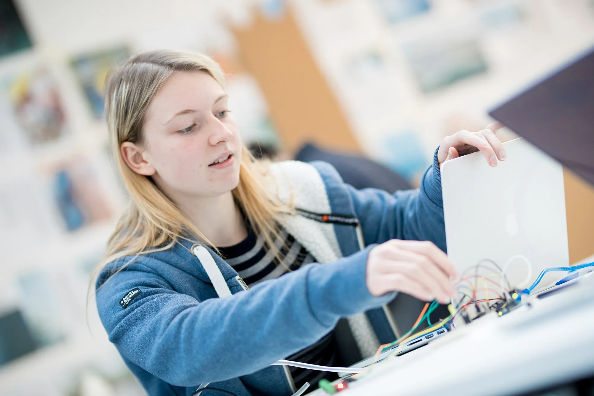A student working on a laptop