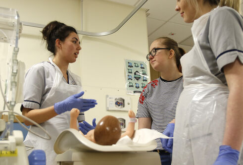 student nurses learning in a clinical setting
