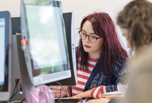 Students in an IT suite
