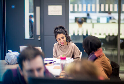 Students studying in a library