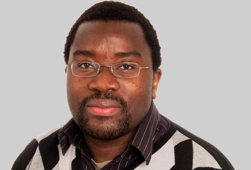 Portrait photo of Ben Kumwenda