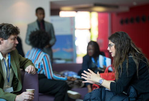 two people engaged in a conversation