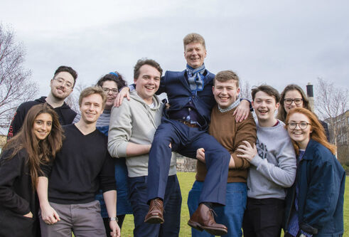 University of Dundee Rector Jim Spence being lifted off the ground by students