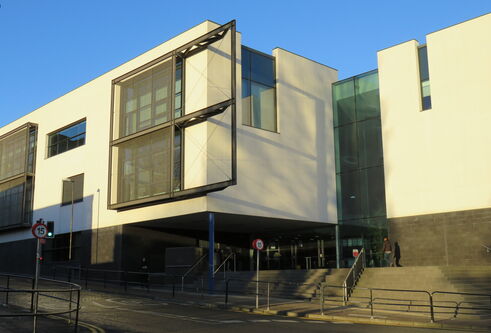 White building and blue sky