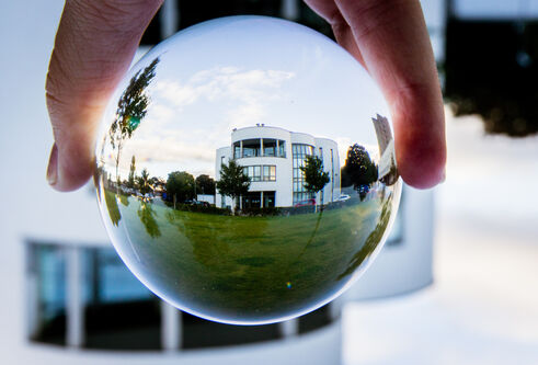 White building in glass sphere