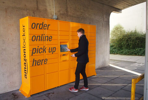 yellow lockers with a person collecting a parcel