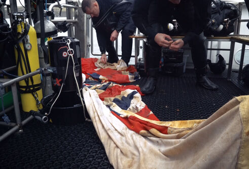 Royal oak ensign on deck of boat