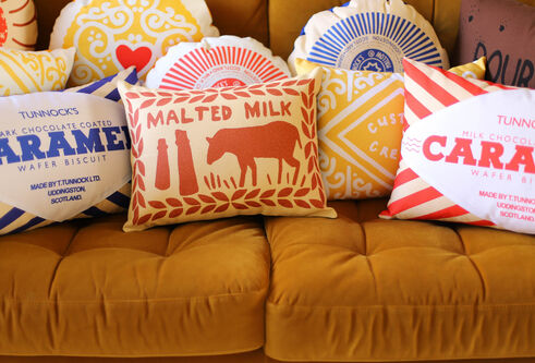 cushions that look like biscuits on a sofa