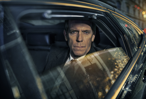 A man in a car with the window down
