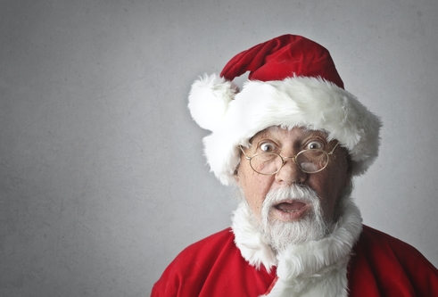 Santa Claus with a shocked expression on his face