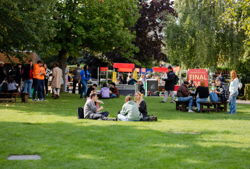 students on campus green