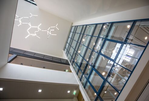 Life sciences building , looking up at windows from bottom floor 