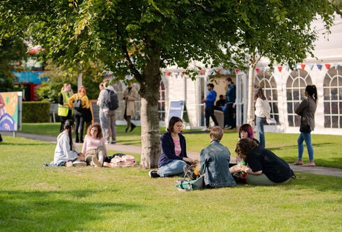 Student on Campus Green during Welcome
