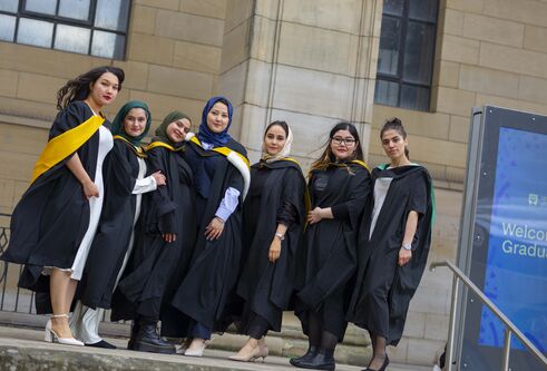 A group of women wearing academic robes at the University of Dundee's Winter Graduation