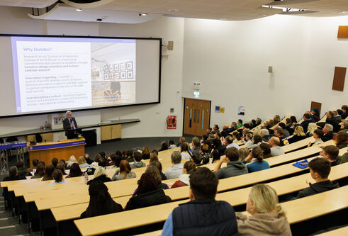A lecture theatre full of people