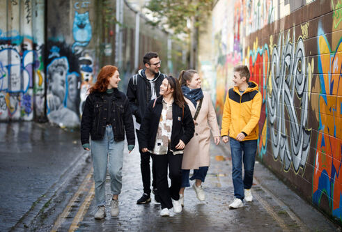A group of students walking in the street