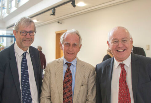 Pete Downes, Peter Garland and Philip Cohen stand together