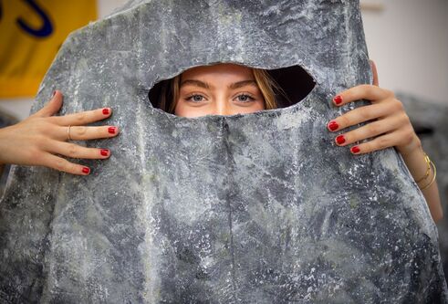 woman's eyes showing out of rock costume	