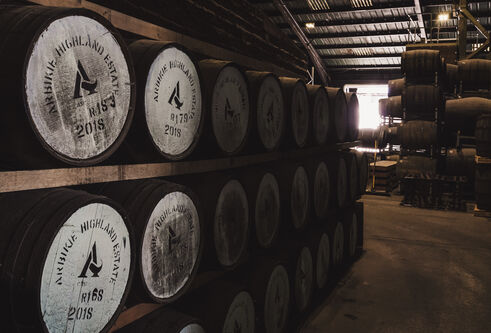 Whisky barrel storage room with a window