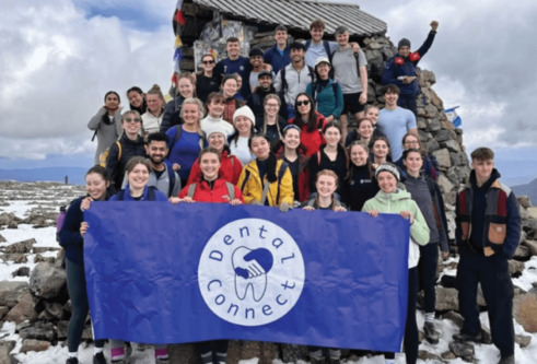 Dundee Dental Connect group holding a banner Dundee Connect