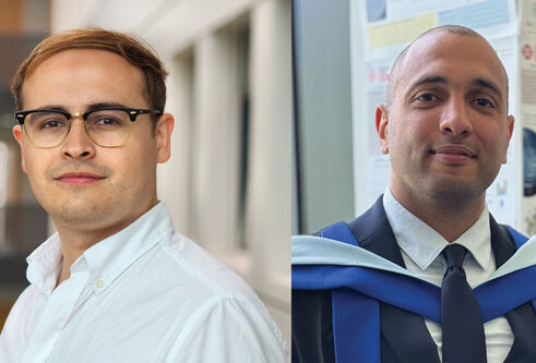 Head and shoulders shot of two men smiling