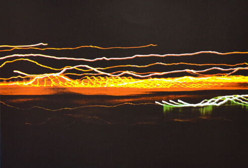 print by Sally May featuring light trails against a black background