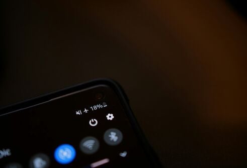 A shot of a mobile phone screen showing a low perecentage of battery available
