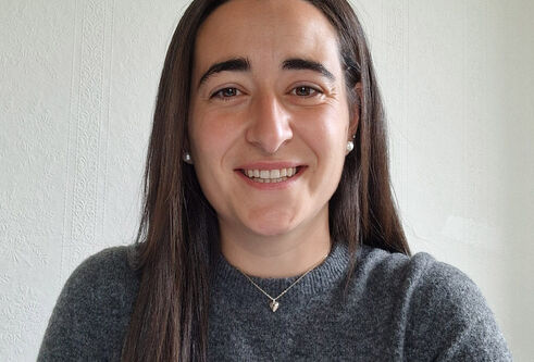 A woman smiling