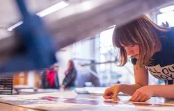student using the printmaking facilities