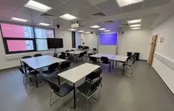 Dalhousie 1S18 - four sets of square tables with chairs and two screens