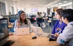 students working together in the library
