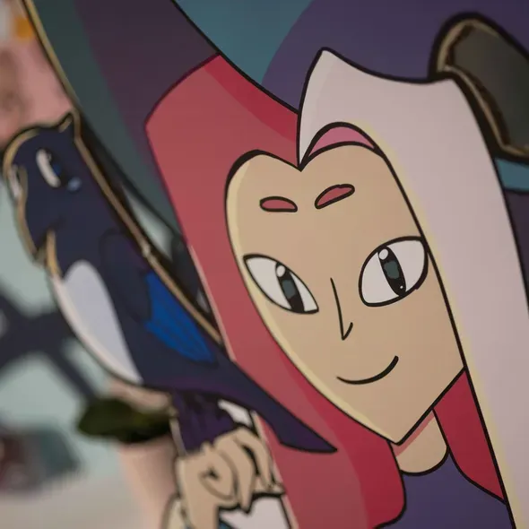 An drawing of a person with red and pink hair as part of the Degree Show 2025 exhibition