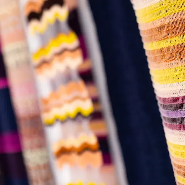 Colourful striped material hanging down as part of the graduate showcase exhibition