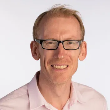 Portrait photo of Alistair Geddes