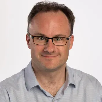 Portrait photo of Andrew Brennan