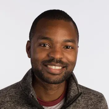 Portrait photo of Chi Onyekaba