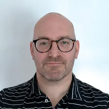 Portrait photo of Damon Herd