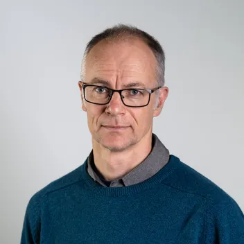 Portrait photo of Tom Owen-Hughes