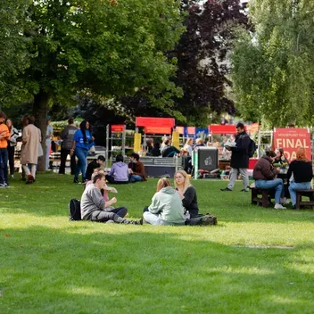 students on campus green