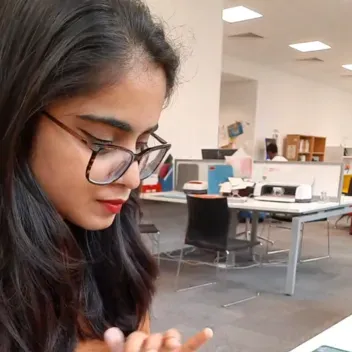 student in front of craft tools