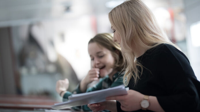 Two students laughing