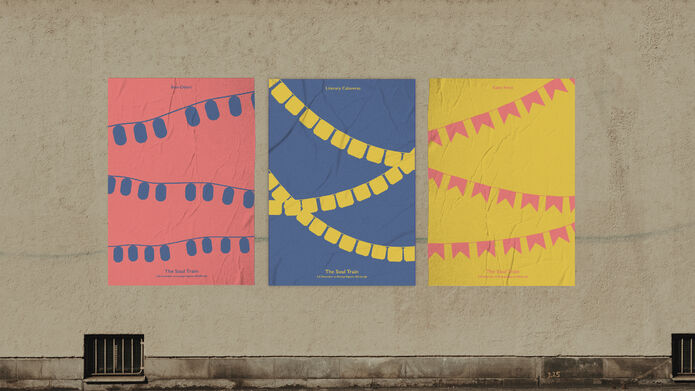 pink blue and yellow sheets of card with flags over