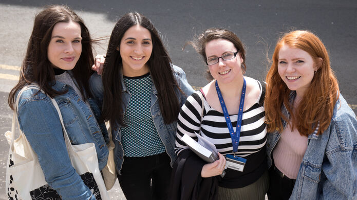 Group of women standing outside together