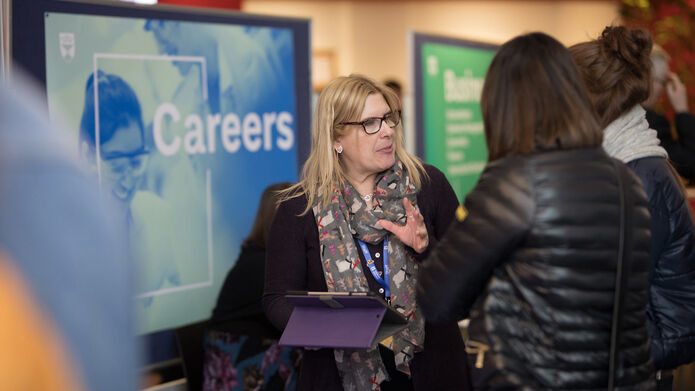 Staff and students at a careers event