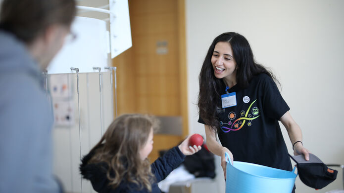 girl holding a bucket